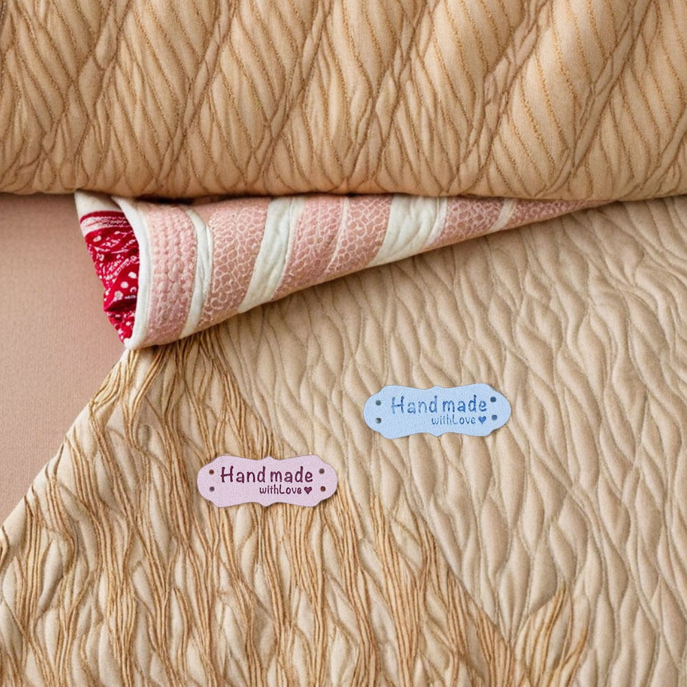 100Pcs Handmade Embossed Suede - Sewing Label recension och pris