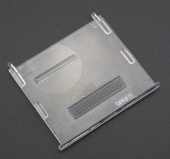 BOBBIN COVER PLATE #359824-900 - Twin Needle Stretch recension och pris